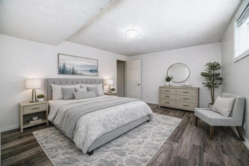 104 Panamount Terrace Nw, Calgary, AB - Indoor Photo Showing Bedroom