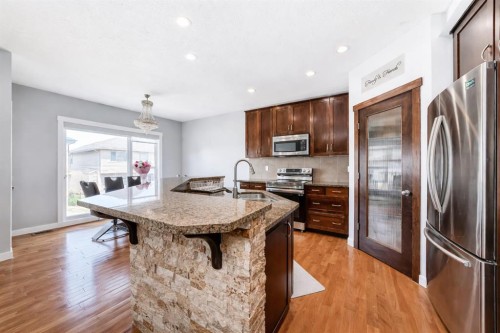 104 Panamount Terrace Nw, Calgary, AB - Indoor Photo Showing Kitchen With Stainless Steel Kitchen With Upgraded Kitchen