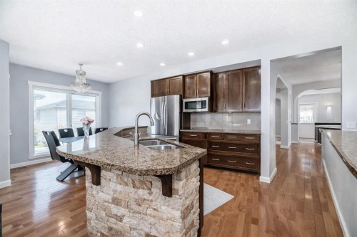 104 Panamount Terrace Nw, Calgary, AB - Indoor Photo Showing Kitchen With Stainless Steel Kitchen With Double Sink With Upgraded Kitchen