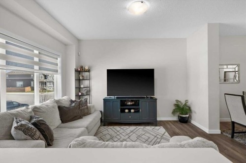 589 Masters Road Se, Calgary, AB - Indoor Photo Showing Living Room