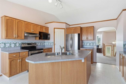 111 Coverton Close Ne, Calgary, AB - Indoor Photo Showing Kitchen With Double Sink