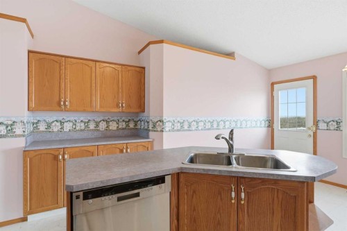 111 Coverton Close Ne, Calgary, AB - Indoor Photo Showing Kitchen With Double Sink