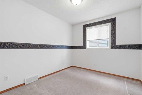 111 Coverton Close Ne, Calgary, AB - Indoor Photo Showing Other Room