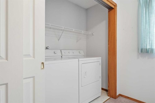 111 Coverton Close Ne, Calgary, AB - Indoor Photo Showing Laundry Room