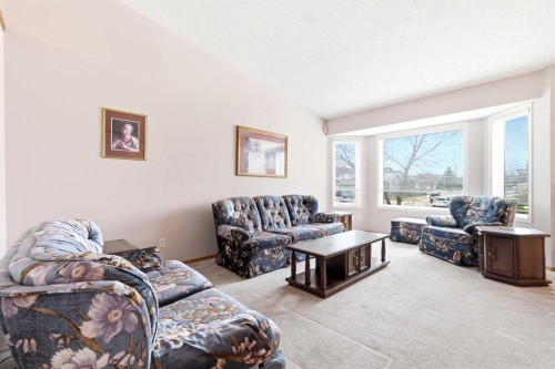 111 Coverton Close Ne, Calgary, AB - Indoor Photo Showing Living Room