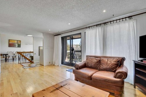 5819 Coach Hill Road Sw, Calgary, AB - Indoor Photo Showing Living Room