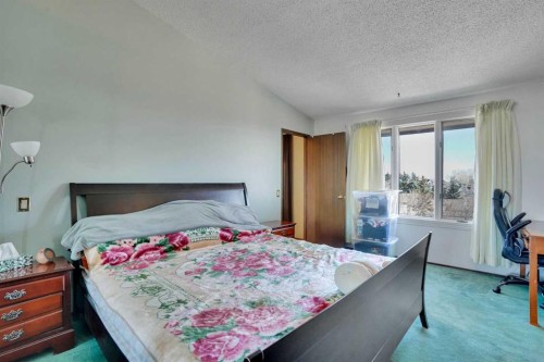 5819 Coach Hill Road Sw, Calgary, AB - Indoor Photo Showing Bedroom
