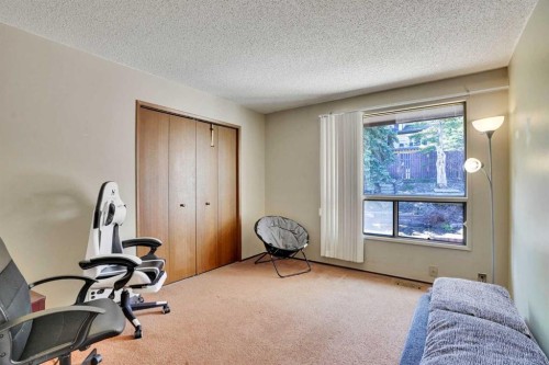 5819 Coach Hill Road Sw, Calgary, AB - Indoor Photo Showing Gym Room