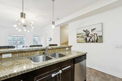 6-1729 34 Avenue Sw, Calgary, AB - Indoor Photo Showing Kitchen With Double Sink