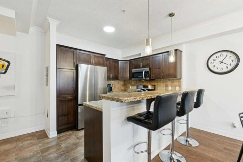 6-1729 34 Avenue Sw, Calgary, AB - Indoor Photo Showing Kitchen With Stainless Steel Kitchen With Upgraded Kitchen