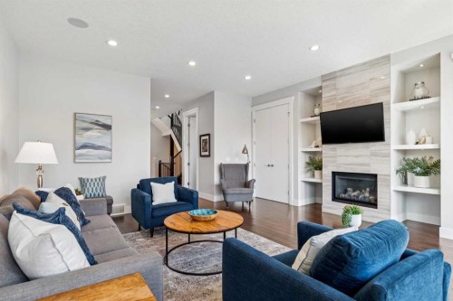 2205 3 Avenue Nw, Calgary, AB - Indoor Photo Showing Living Room With Fireplace