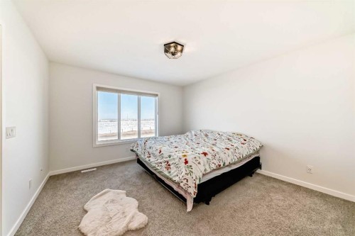 82 Magnolia Court Se, Calgary, AB - Indoor Photo Showing Bedroom