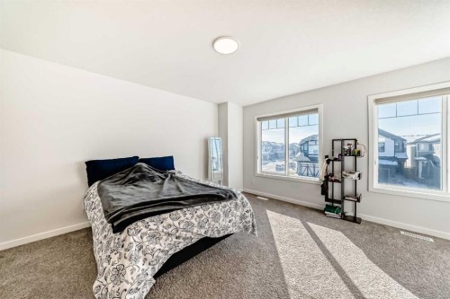 82 Magnolia Court Se, Calgary, AB - Indoor Photo Showing Bedroom