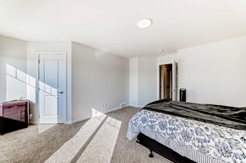 82 Magnolia Court Se, Calgary, AB - Indoor Photo Showing Bedroom