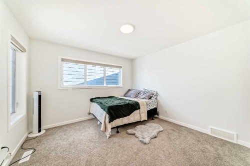82 Magnolia Court Se, Calgary, AB - Indoor Photo Showing Bedroom