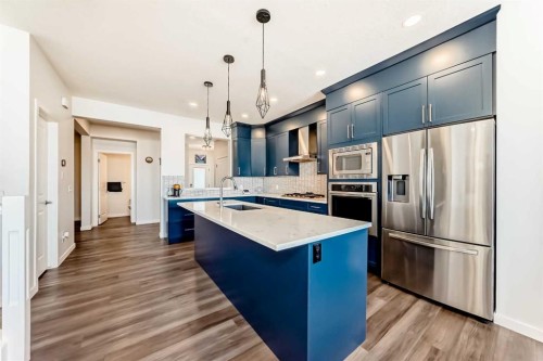 82 Magnolia Court Se, Calgary, AB - Indoor Photo Showing Kitchen With Upgraded Kitchen