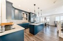 82 Magnolia Court Se, Calgary, AB  - Indoor Photo Showing Kitchen With Upgraded Kitchen 