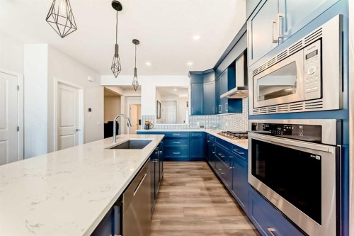 82 Magnolia Court Se, Calgary, AB - Indoor Photo Showing Kitchen With Upgraded Kitchen