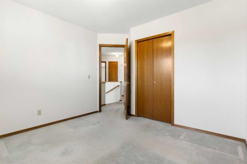 190 Hawkville Close Nw, Calgary, AB - Indoor Photo Showing Other Room