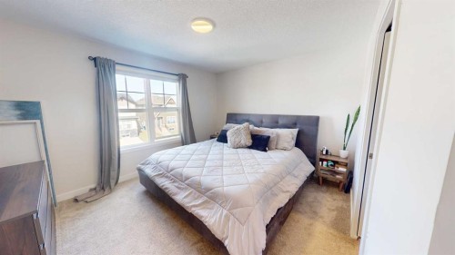 115 Magnolia Drive Se, Calgary, AB - Indoor Photo Showing Bedroom