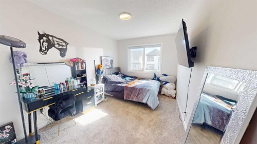 115 Magnolia Drive Se, Calgary, AB - Indoor Photo Showing Bedroom
