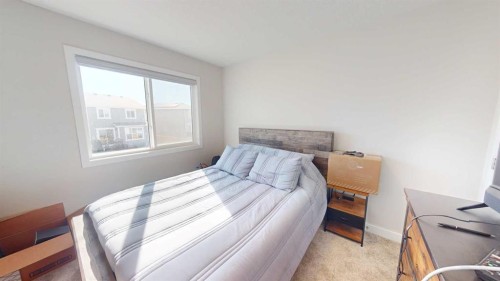 115 Magnolia Drive Se, Calgary, AB - Indoor Photo Showing Bedroom