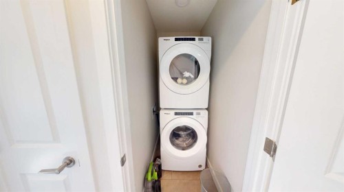 115 Magnolia Drive Se, Calgary, AB - Indoor Photo Showing Laundry Room
