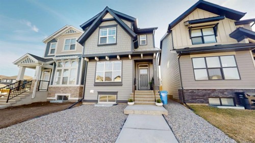 115 Magnolia Drive Se, Calgary, AB - Outdoor With Facade