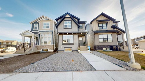 115 Magnolia Drive Se, Calgary, AB - Outdoor With Facade