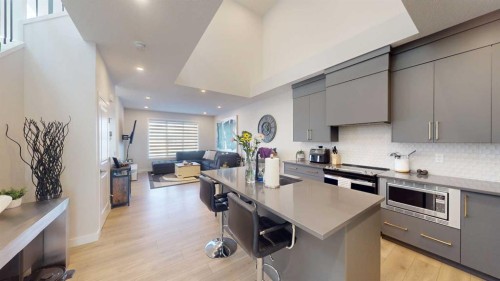 115 Magnolia Drive Se, Calgary, AB - Indoor Photo Showing Kitchen With Upgraded Kitchen