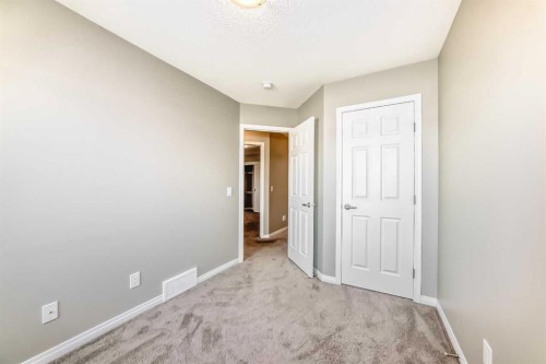 147 Windford Crescent Sw, Airdrie, AB - Indoor Photo Showing Other Room