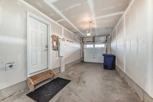 147 Windford Crescent Sw, Airdrie, AB - Indoor Photo Showing Garage