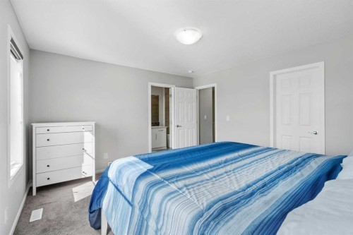 171 Carringham Road Nw, Calgary, AB - Indoor Photo Showing Bedroom