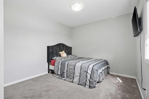 171 Carringham Road Nw, Calgary, AB - Indoor Photo Showing Bedroom