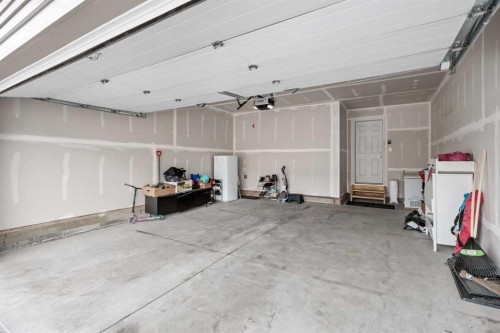 171 Carringham Road Nw, Calgary, AB - Indoor Photo Showing Garage