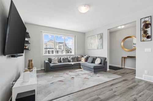 171 Carringham Road Nw, Calgary, AB - Indoor Photo Showing Living Room