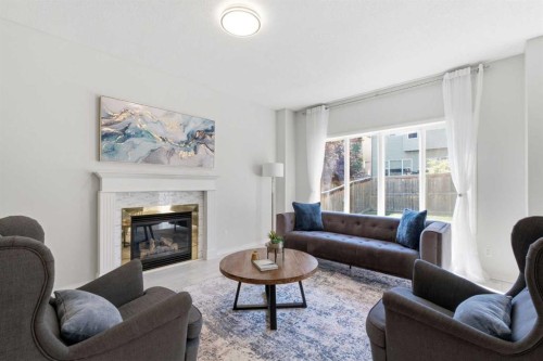 124 Kincora Glen Road Nw, Calgary, AB - Indoor Photo Showing Living Room With Fireplace