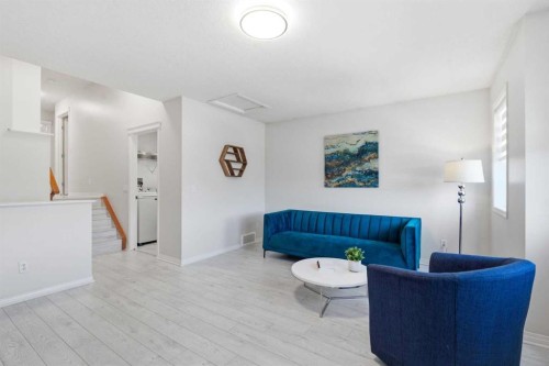 124 Kincora Glen Road Nw, Calgary, AB - Indoor Photo Showing Living Room