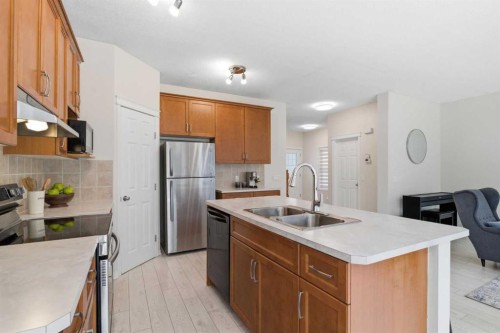 124 Kincora Glen Road Nw, Calgary, AB - Indoor Photo Showing Kitchen With Double Sink