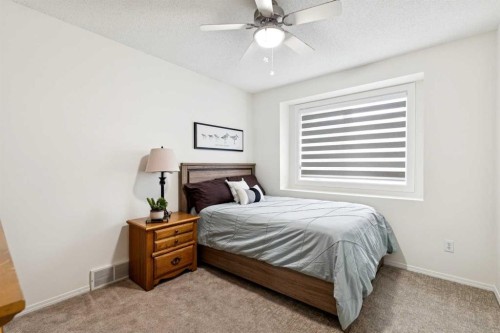 52 Christie Knoll Heights Sw, Calgary, AB - Indoor Photo Showing Bedroom