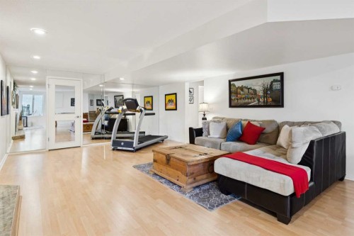 52 Christie Knoll Heights Sw, Calgary, AB - Indoor Photo Showing Living Room