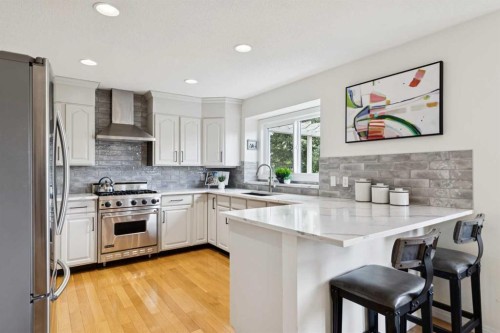 52 Christie Knoll Heights Sw, Calgary, AB - Indoor Photo Showing Kitchen With Stainless Steel Kitchen With Upgraded Kitchen