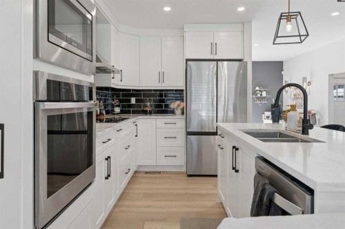 691 Brookpark Drive Sw, Calgary, AB - Indoor Photo Showing Kitchen With Stainless Steel Kitchen With Double Sink With Upgraded Kitchen