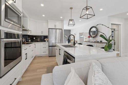 691 Brookpark Drive Sw, Calgary, AB - Indoor Photo Showing Kitchen With Stainless Steel Kitchen With Double Sink With Upgraded Kitchen