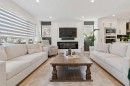 691 Brookpark Drive Sw, Calgary, AB  - Indoor Photo Showing Living Room With Fireplace 
