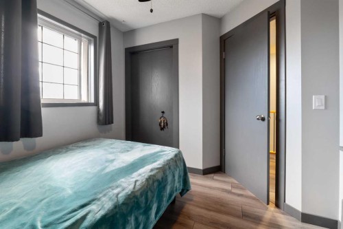 11 Woodside Circle, Airdrie, AB - Indoor Photo Showing Bedroom