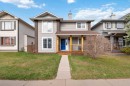 11 Woodside Circle, Airdrie, AB  - Outdoor With Deck Patio Veranda With Facade 
