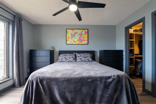 11 Woodside Circle, Airdrie, AB - Indoor Photo Showing Bedroom