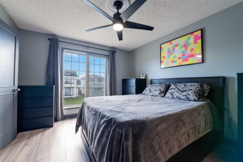11 Woodside Circle, Airdrie, AB - Indoor Photo Showing Bedroom