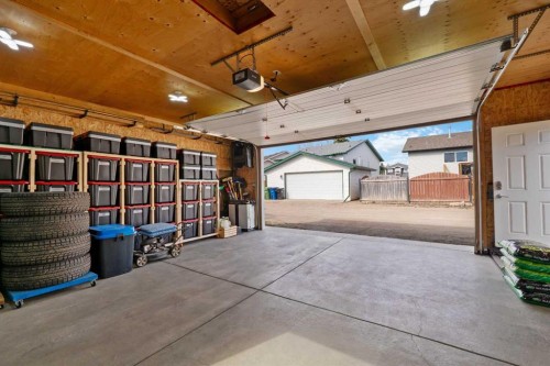 11 Woodside Circle, Airdrie, AB - Indoor Photo Showing Garage